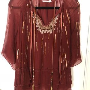Anthropologie rust colored peasant top